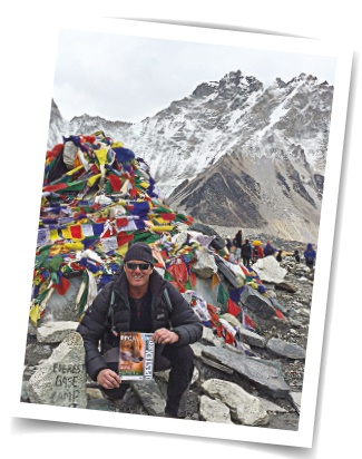 David Lacey David Lacey at Everest Basecamp with some quality reading matter in case of, y’know, boredom.